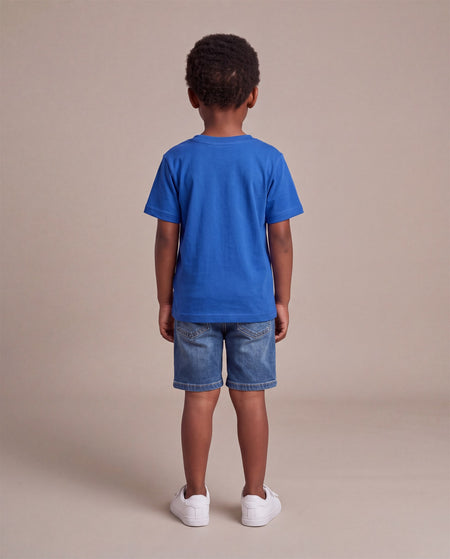 Hopper royal blue kids t-shirt worn by a model, back
