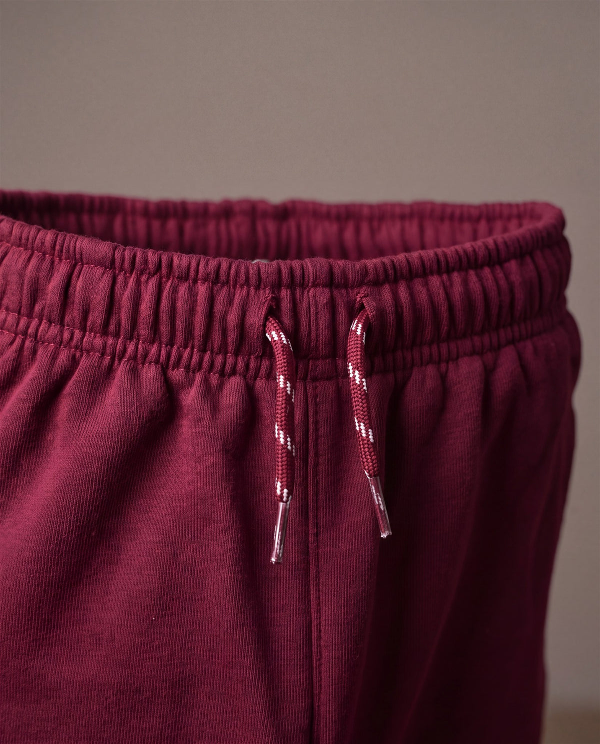 Hopper burgundy kids joggers, waistband and drawstring close-up