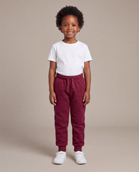 Hopper burgundy kids joggers worn by a model, front