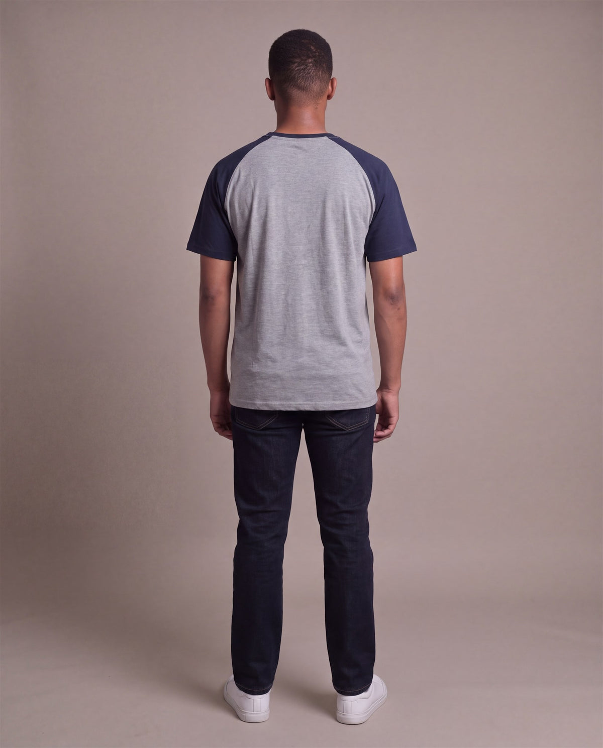 Hopper grey and navy raglan t-shirt worn by a model, back