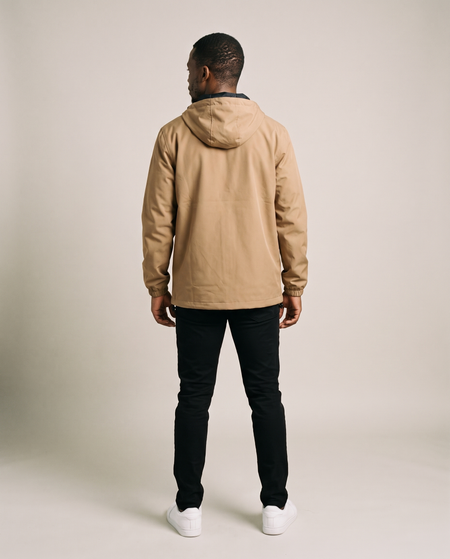 Hopper tan hooded windbreaker jacket worn by a model, back view