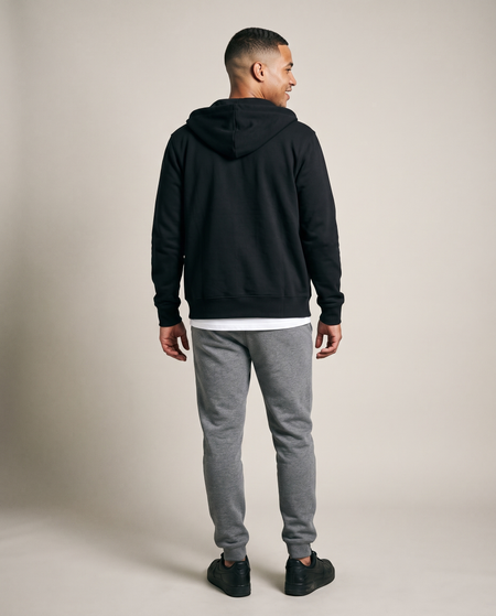 Hopper black zip hoodie worn by a model, back view