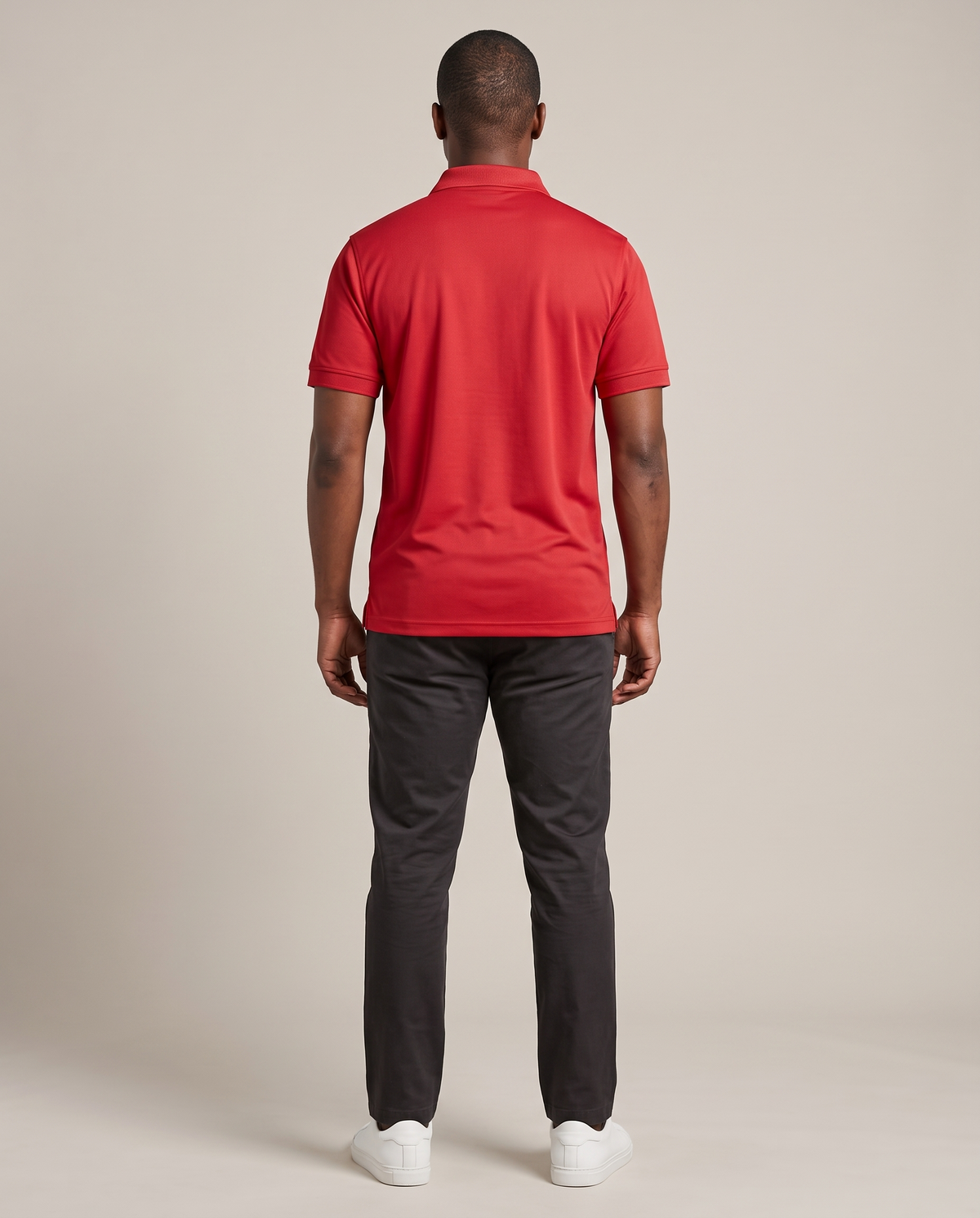 Hopper red G320 golf shirt worn by a model, back view