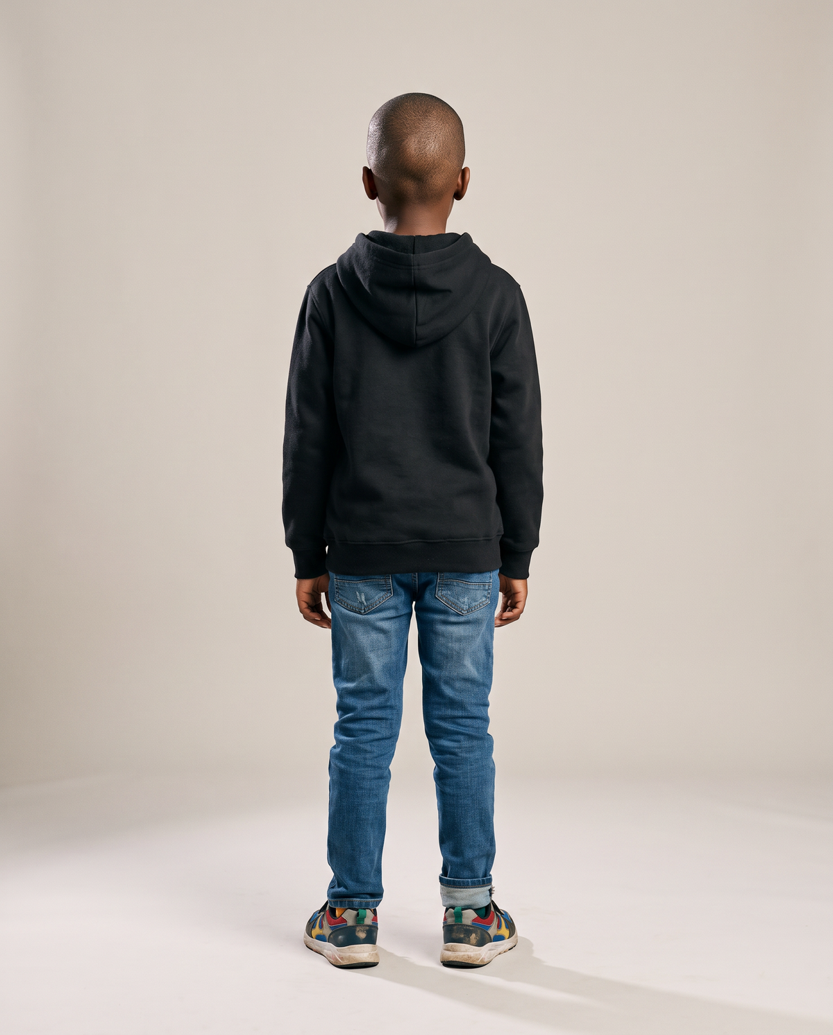 Hopper kids black hoodie worn by a model, back view