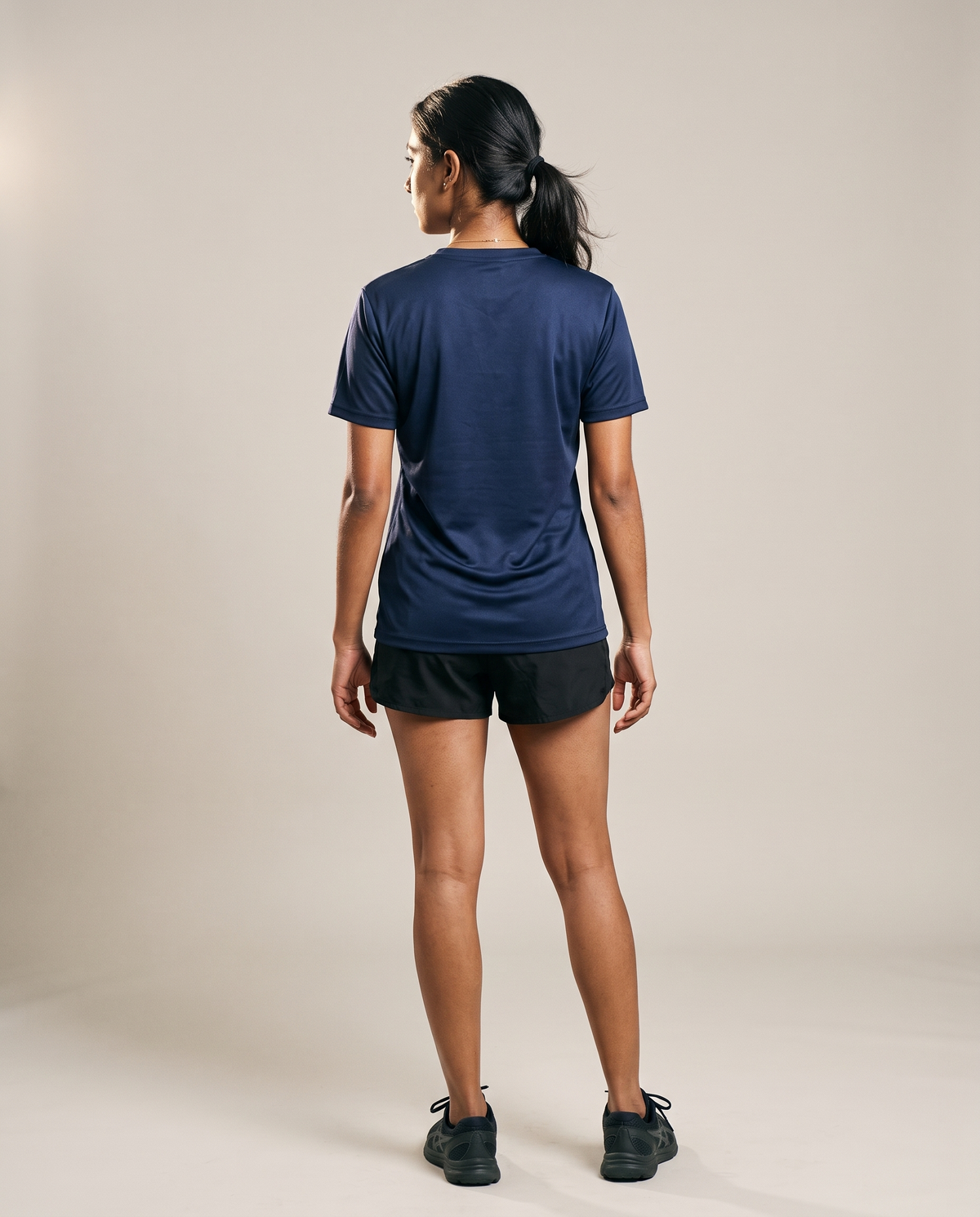 Hopper navy polyester t-shirt worn by a model, back view