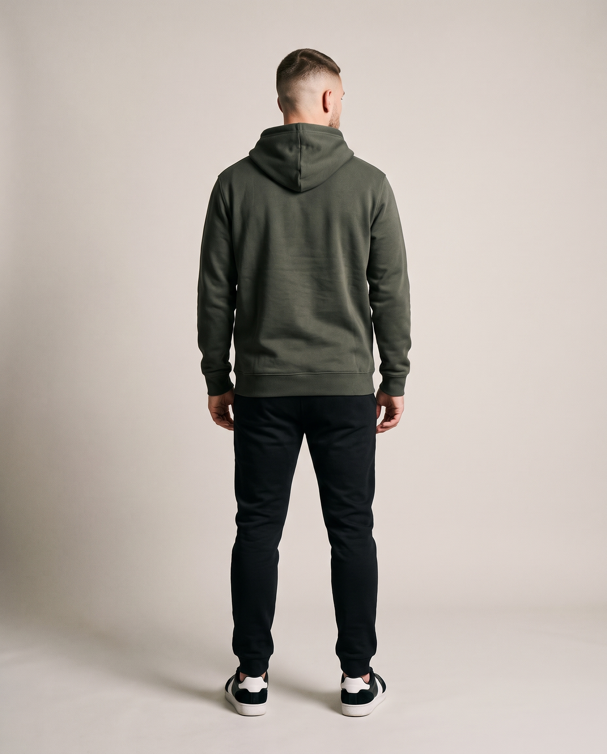 Hopper olive green 320gsm hoodie worn by a model, back view