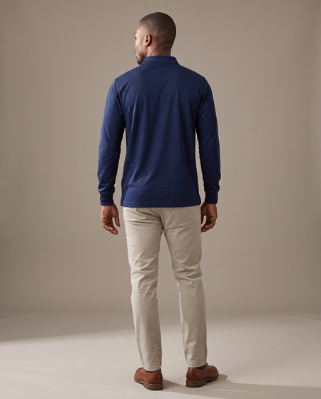 Hopper navy long-sleeve golf shirt worn by a model, back view