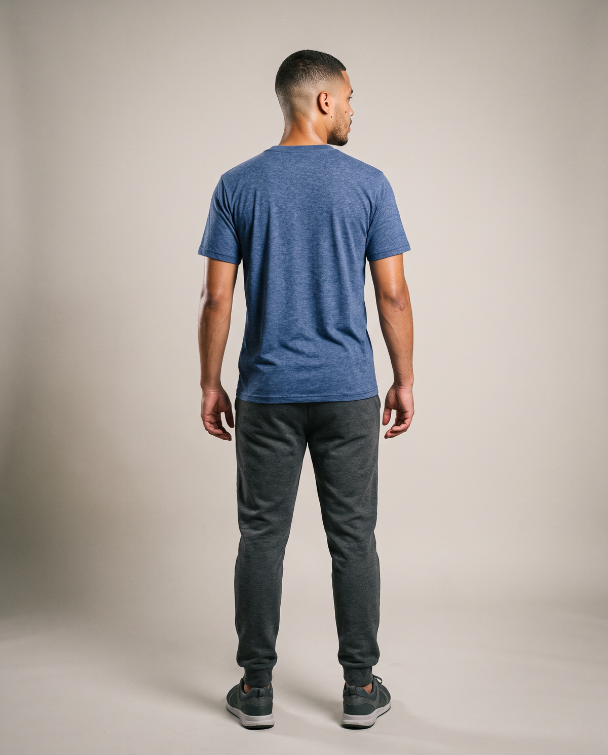 Hopper blue heather melange t-shirt worn by a model, back view