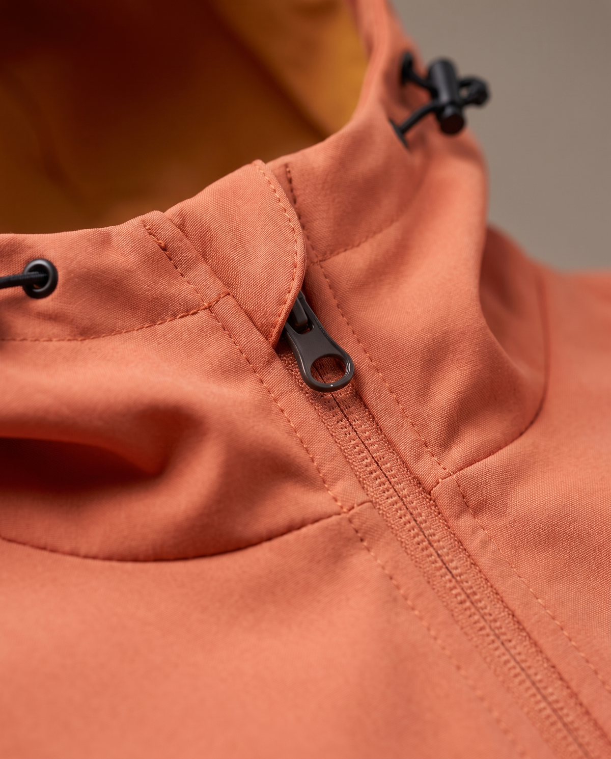 Hopper orange waterproof jacket, fabric and construction close-up