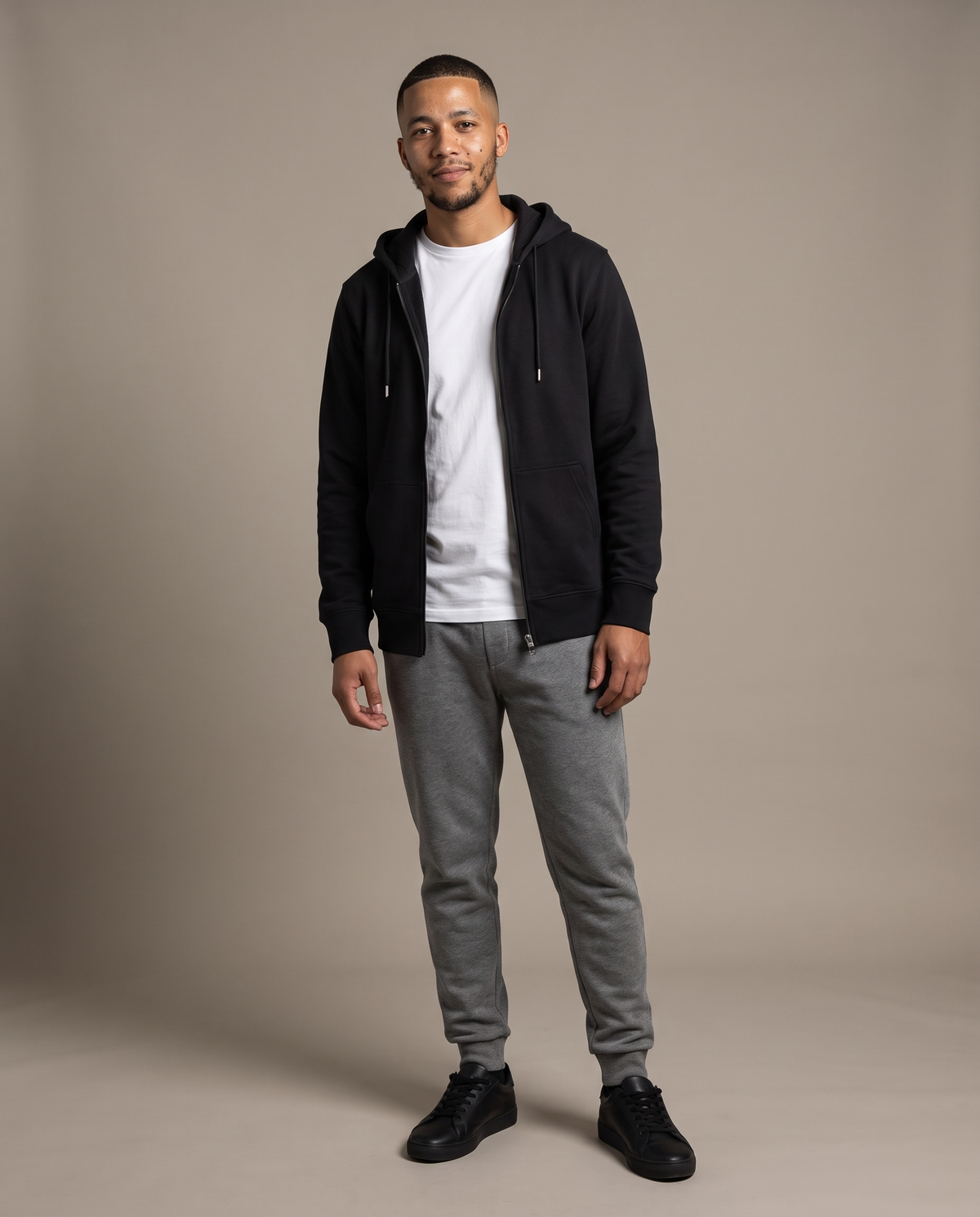 Hopper black zip hoodie worn by a model, front view