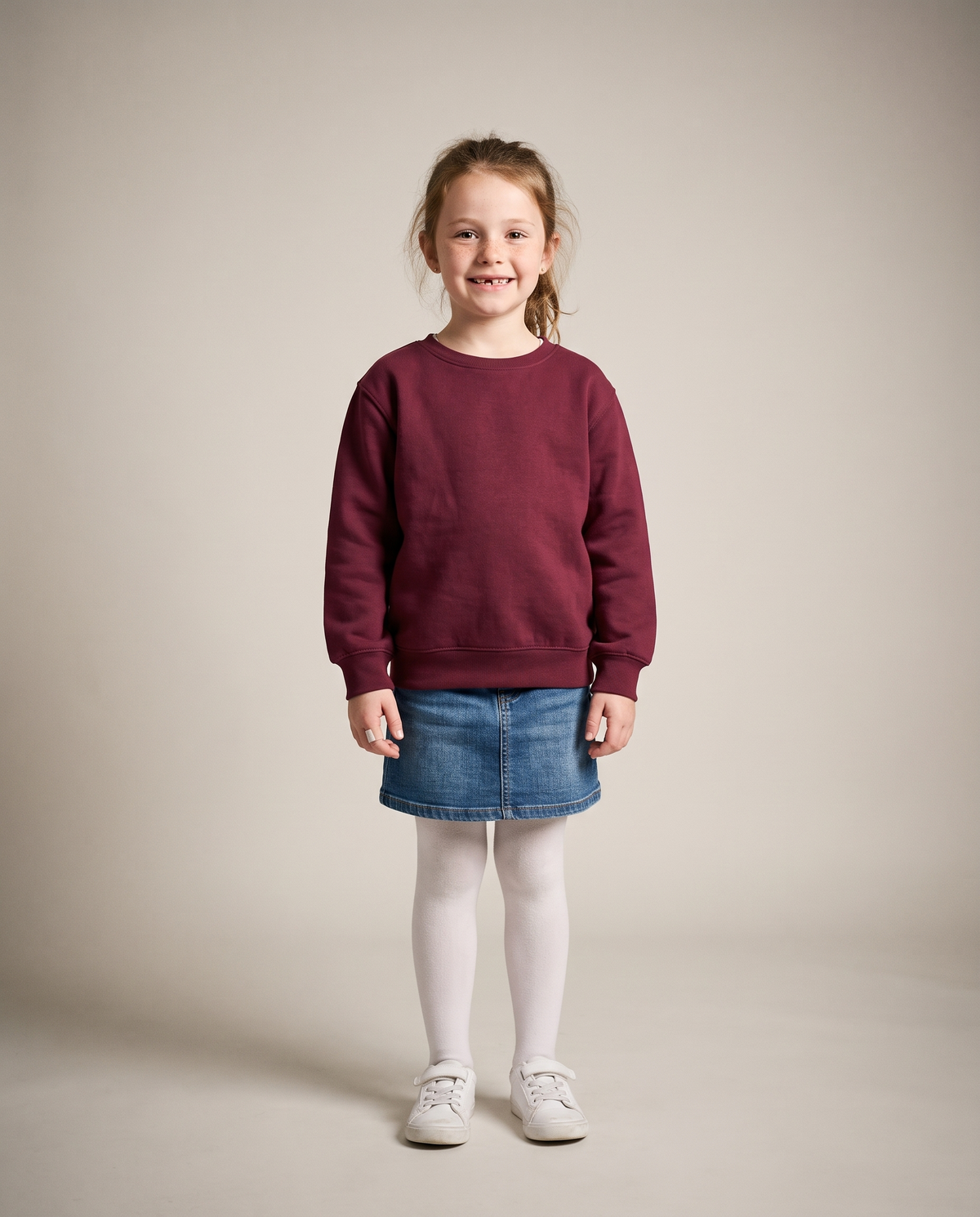 Hopper kids burgundy crewneck sweater worn by a model, front view