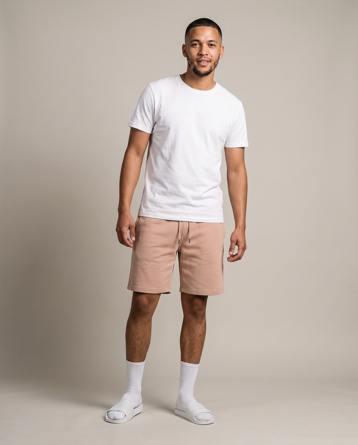 Hopper beige fleece shorts worn by a model, front view