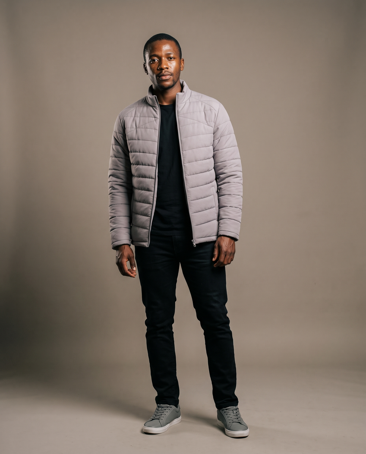 Hopper grey puffer jacket without hood worn by a model, front view