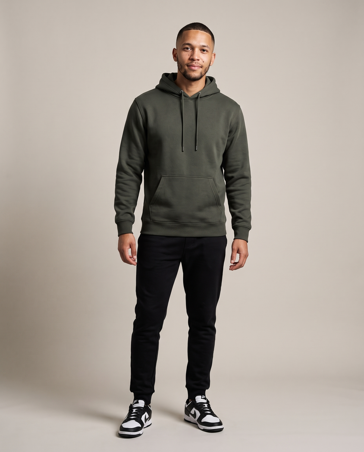 Hopper olive green 320gsm hoodie worn by a model, front view