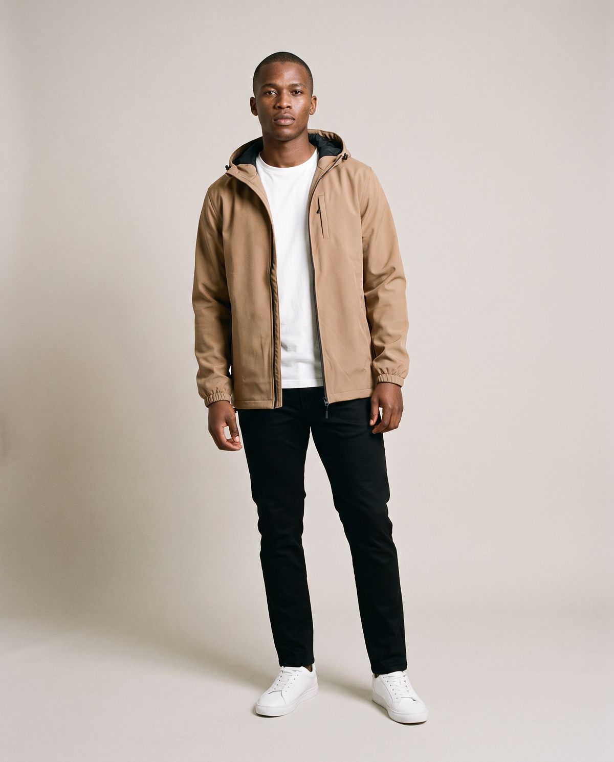 Hopper tan hooded windbreaker jacket worn by a model, front view