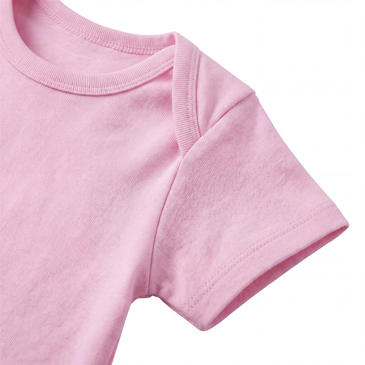 Hopper pink baby romper, neckline binding and shoulder construction close-up