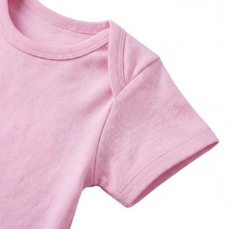 Hopper pink baby romper, neckline binding and shoulder construction close-up